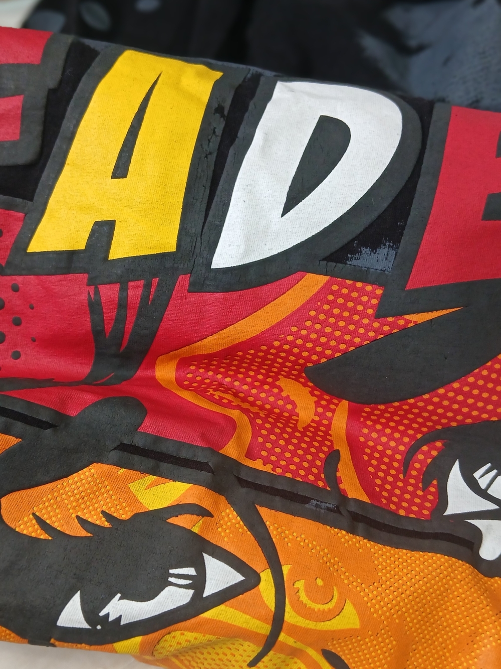 Bold Graphic Tee with Red, Yellow, Orange and Black Pop Art Print